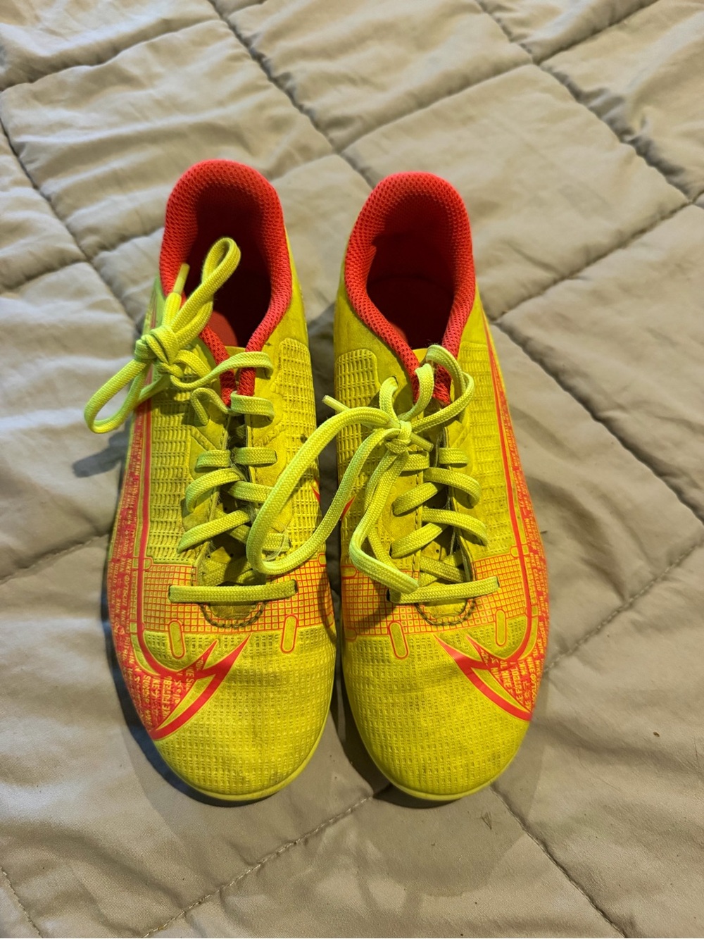 Nike Kids Neon Yellow cleats with Coral Accents